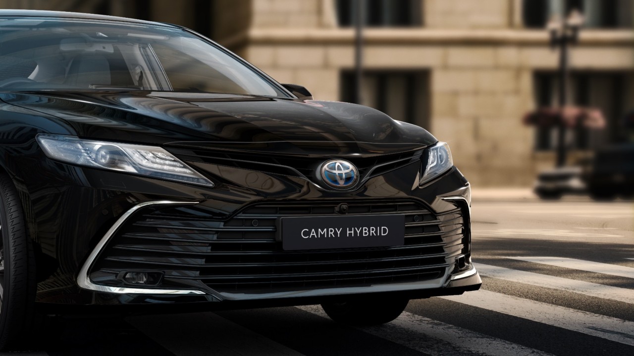 Toyota Corolla Hatchback parked in road